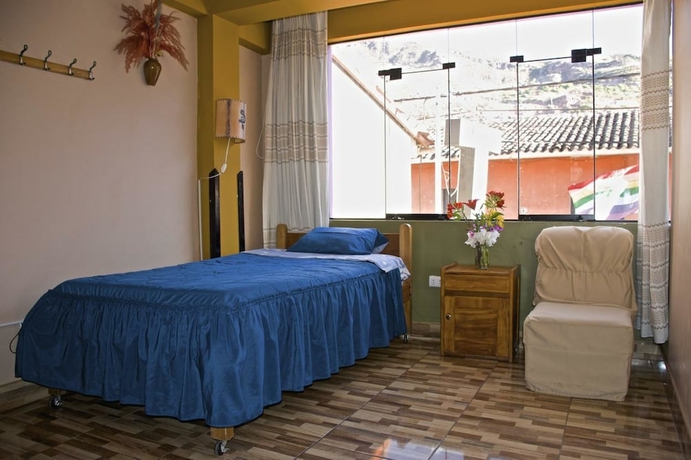 Imagen de la habitación del Hotel Pumawanka Hostal. Foto 14