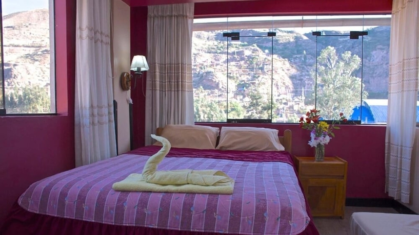 Imagen de la habitación del Hotel Pumawanka Hostal. Foto 15