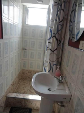 Imagen de la habitación del Hotel Pumawanka Hostal. Foto 16