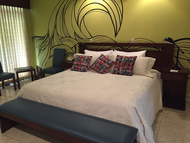 Imagen de la habitación del Hotel Pumilio Mountain and Ocean. Foto 10