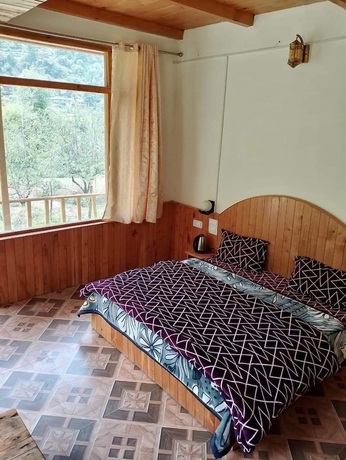 Imagen de la habitación del Hotel Pumpkin Stays Boutique Cottages. Foto 5