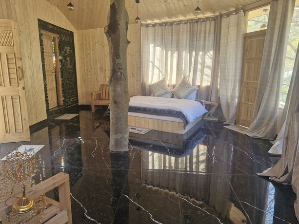 Imagen de la habitación del Hotel Pumpkin Stays Boutique Cottages. Foto 6