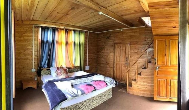 Imagen de la habitación del Hotel Pumpkin Stays Boutique Cottages. Foto 7