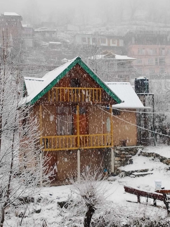 Imagen de la habitación del Hotel Pumpkin Stays Boutique Cottages. Foto 9