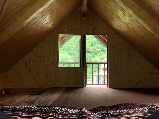 Imagen de la habitación del Hotel Pumpkin Stays Boutique Cottages. Foto 10