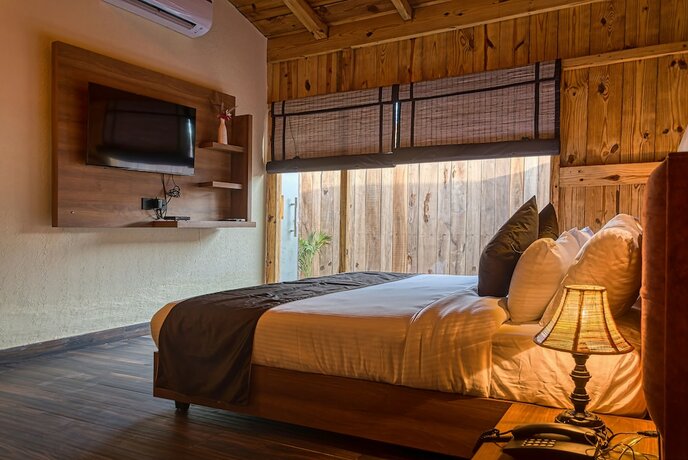 Imagen de la habitación del Hotel Pumpkins Corbett, Tusk N Wood. Foto 16