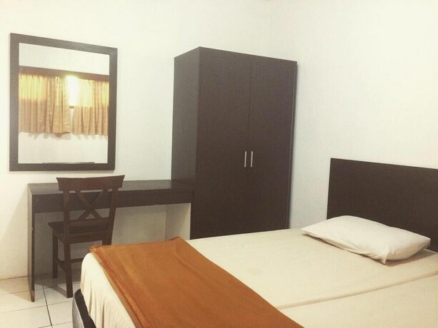 Imagen de la habitación del Hotel Puncak Camp Hills. Foto 9