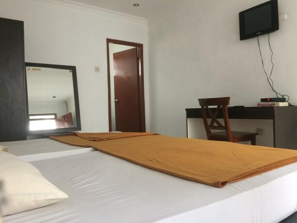Imagen de la habitación del Hotel Puncak Camp Hills. Foto 10