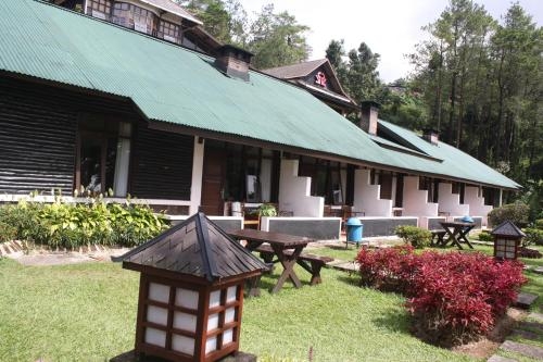 Imagen de la habitación del Hotel Puncak Pass Resort. Foto 9