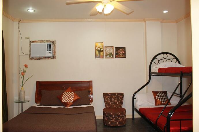 Imagen de la habitación del Hotel Pundaquit Luxury Resort. Foto 12