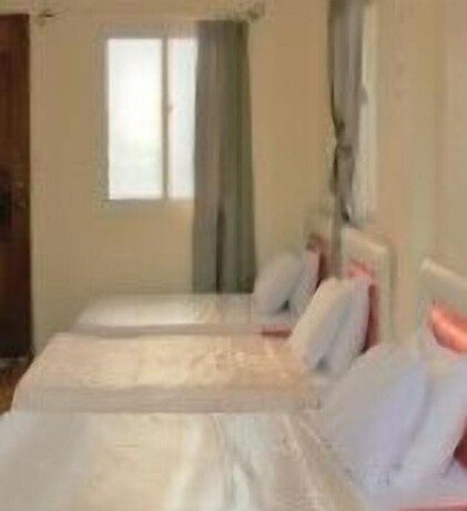 Imagen de la habitación del Hotel Pundaquit Luxury Resort. Foto 19