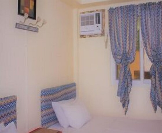 Imagen de la habitación del Hotel Pundaquit Luxury Resort. Foto 20