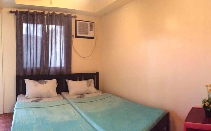 Imagen de la habitación del Hotel Pundaquit Luxury Resort. Foto 26