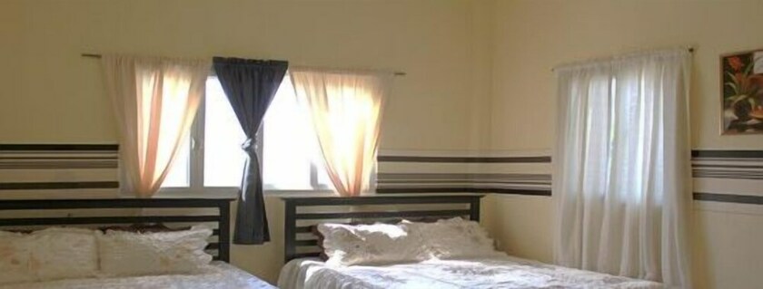 Imagen de la habitación del Hotel Pundaquit Luxury Resort. Foto 32