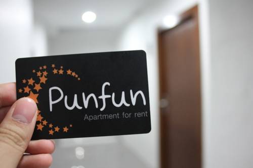 Imagen de la habitación del Hotel Punfun Apartment. Foto 2