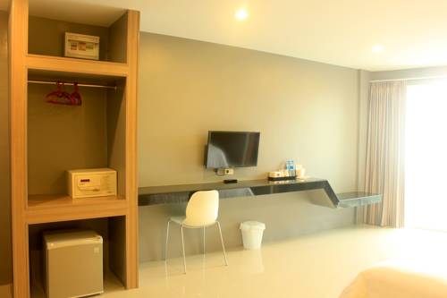 Imagen de la habitación del Hotel Punfun Apartment. Foto 7