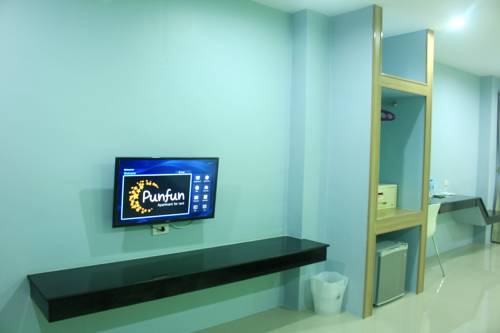 Imagen de la habitación del Hotel Punfun Apartment. Foto 13