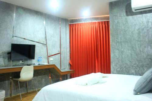 Imagen de la habitación del Hotel Punfun Apartment. Foto 15