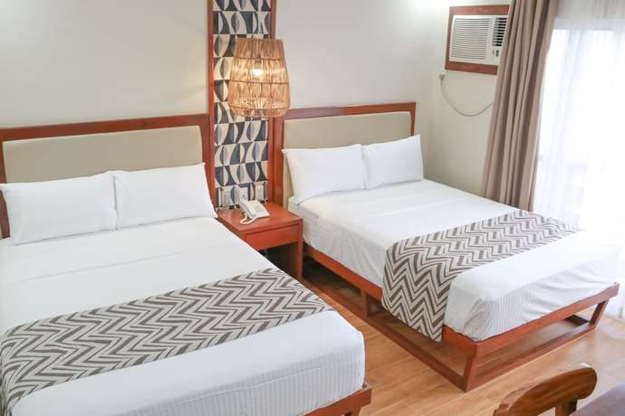 Imagen de la habitación del Hotel Punta Baler Hotel. Foto 10