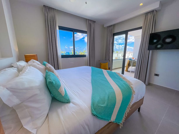 Imagen de la habitación del Hotel Punta Cana Beach Apartments powered by ASTON. Foto 7