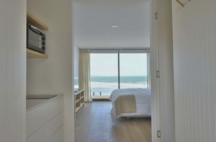 Imagen de la habitación del Hotel Punta Cantera Suites de Mar. Foto 10