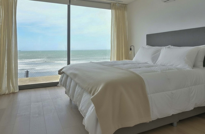 Imagen de la habitación del Hotel Punta Cantera Suites de Mar. Foto 11