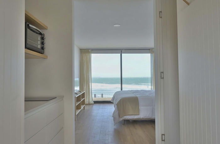 Imagen de la habitación del Hotel Punta Cantera Suites de Mar. Foto 12
