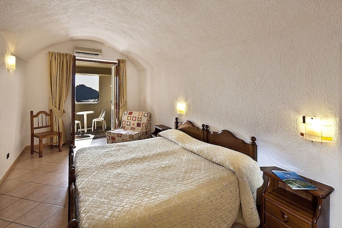 Imagen de la habitación del Hotel Punta Chiarito Resort. Foto 13