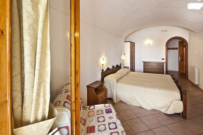 Imagen de la habitación del Hotel Punta Chiarito Resort. Foto 15