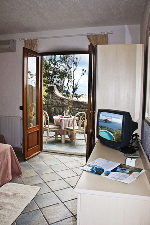 Imagen de la habitación del Hotel Punta Chiarito Resort. Foto 16