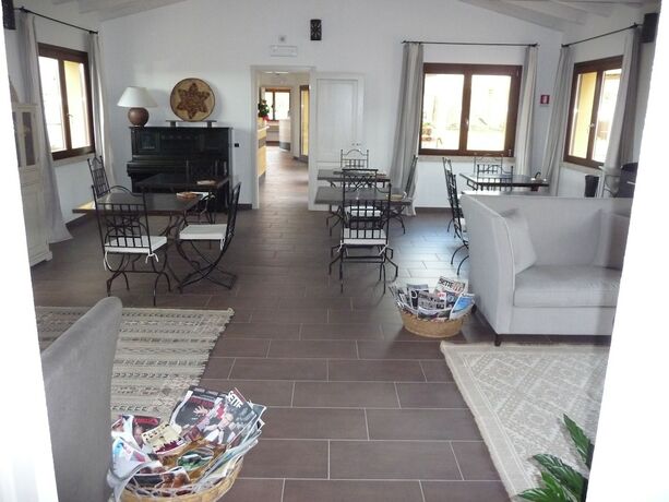 Imagen de la habitación del Hotel Punta Falcone Resort. Foto 7