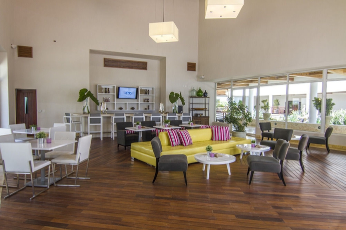 Imagen del bar/restaurante del Hotel Punta Palmera Cap Cana By Essenza Retreats. Foto 3