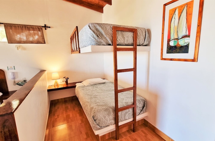 Imagen de la habitación del Hotel Punta del Norte Bungalows. Foto 6