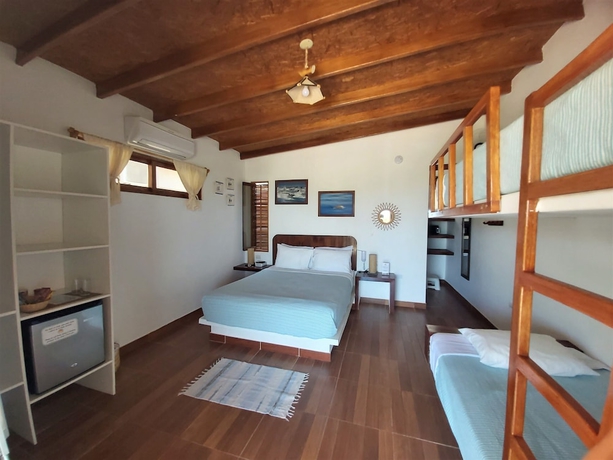 Imagen de la habitación del Hotel Punta del Norte Bungalows. Foto 7