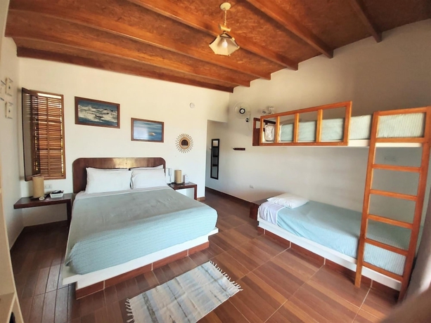 Imagen de la habitación del Hotel Punta del Norte Bungalows. Foto 8