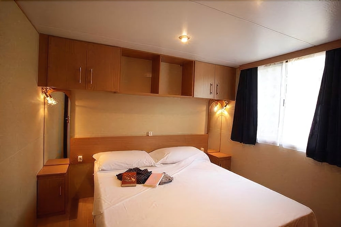 Imagen de la habitación del Hotel Puntala Camp & Resort. Foto 8