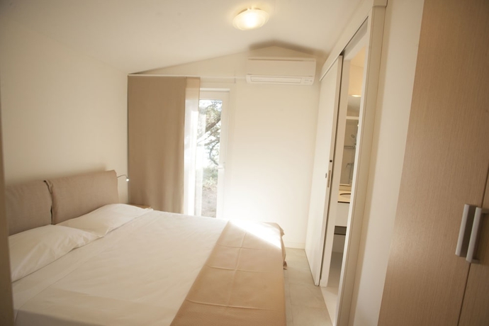 Imagen de la habitación del Hotel Puntala Camp & Resort. Foto 12