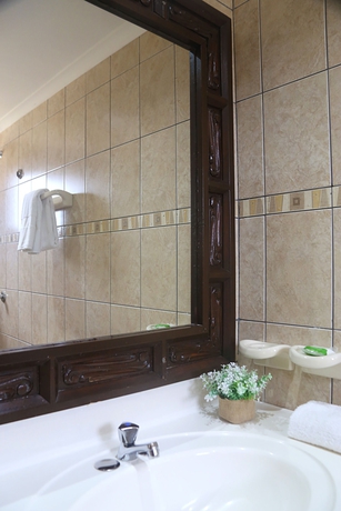 Imagen de la habitación del Hotel Punto Di Oro Residences. Foto 2