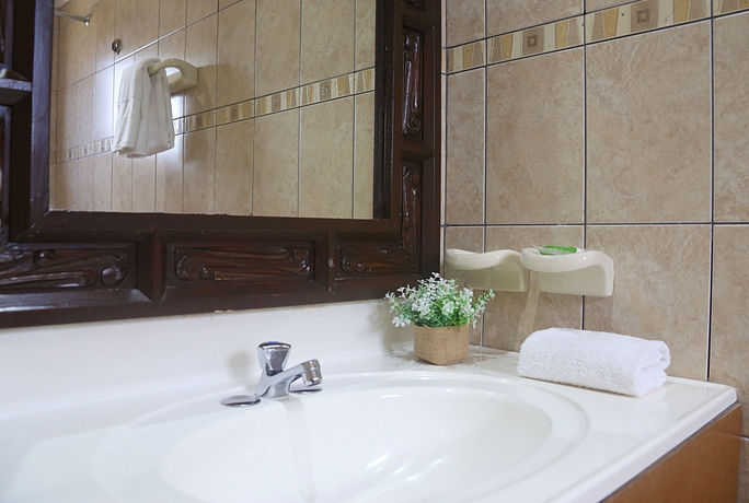 Imagen de la habitación del Hotel Punto Di Oro Residences. Foto 4