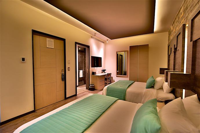 Imagen de la habitación del Hotel Punto MX. Foto 3