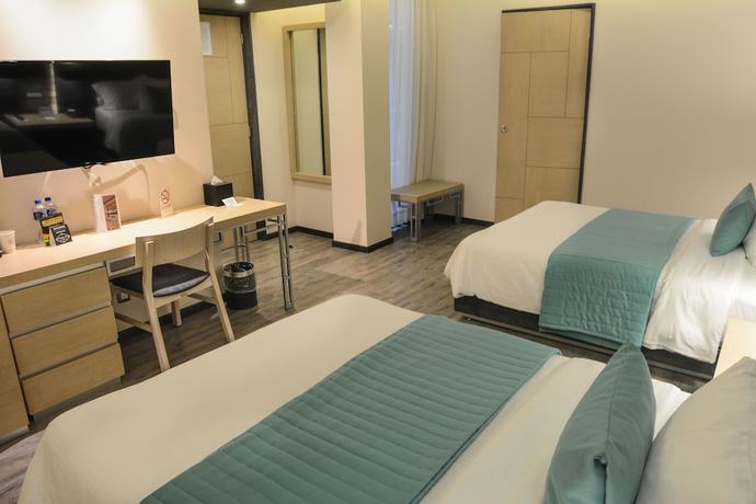 Imagen de la habitación del Hotel Punto MX. Foto 4