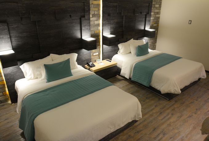 Imagen de la habitación del Hotel Punto MX. Foto 5