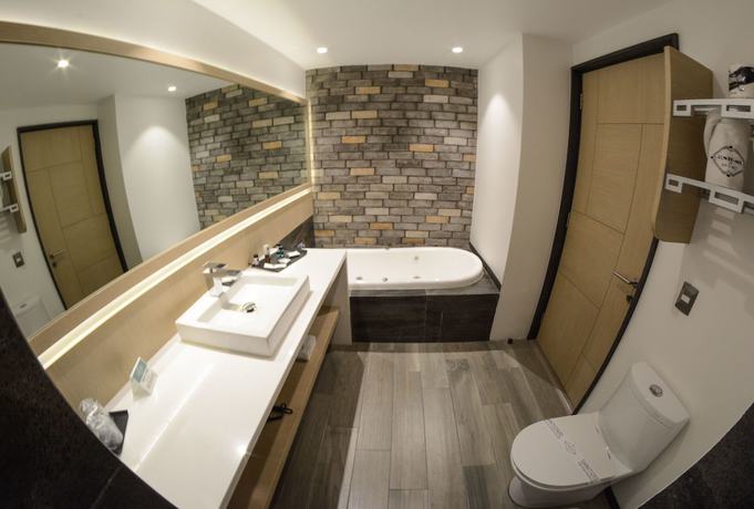 Imagen de la habitación del Hotel Punto MX. Foto 7