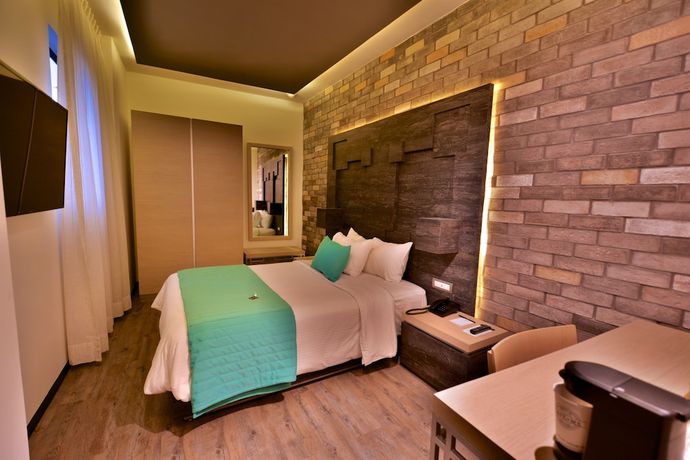 Imagen de la habitación del Hotel Punto MX. Foto 8