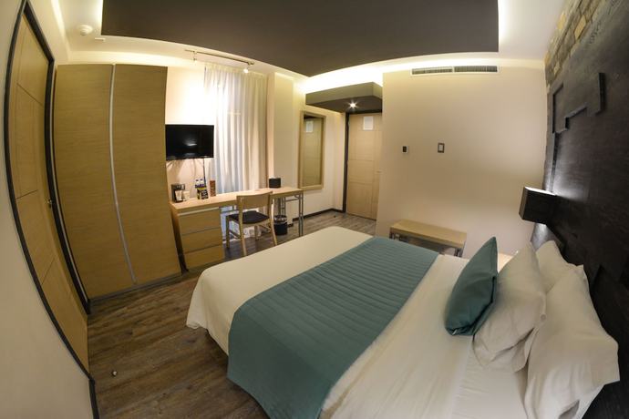 Imagen de la habitación del Hotel Punto MX. Foto 11