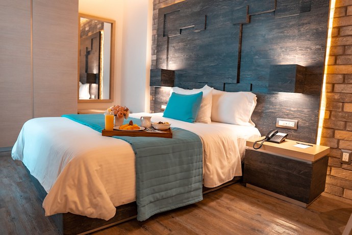 Imagen de la habitación del Hotel Punto MX. Foto 13