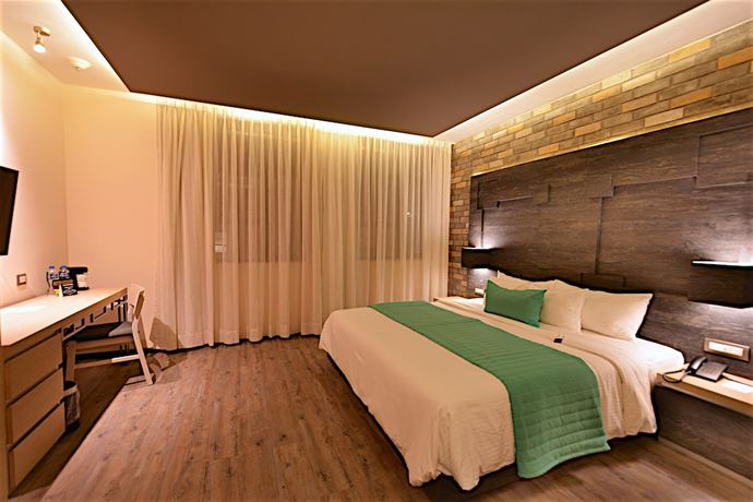 Imagen de la habitación del Hotel Punto MX. Foto 14