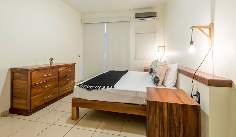 Imagen de la habitación del Hotel Punto Mita Suites. Foto 4