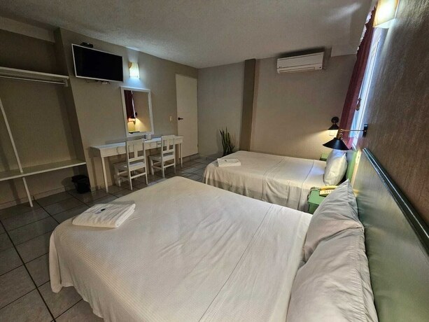 Imagen de la habitación del Hotel Punto Poza Rica. Foto 15