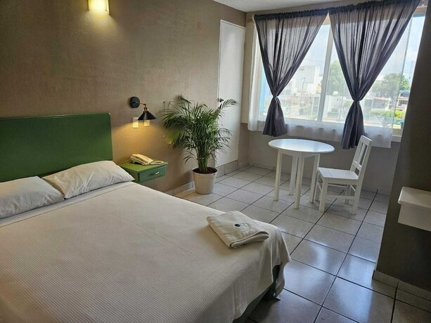 Imagen de la habitación del Hotel Punto Poza Rica. Foto 17